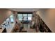 Second story view of the open concept living room with decorative touches at 4232 Parliament Way, Avon, IN 46123