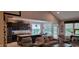 Cozy living room with a vaulted ceiling, opening to a breakfast nook and kitchen at 4232 Parliament Way, Avon, IN 46123