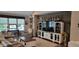 Comfortable living room featuring a large entertainment center and a rustic coffee table at 4232 Parliament Way, Avon, IN 46123