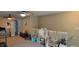 Upstairs loft area featuring neutral walls and carpet at 4232 Parliament Way, Avon, IN 46123