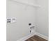 Utility area with washer/dryer hookups and storage shelves at 449 Shade St, Carmel, IN 46290