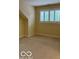 Cozy bedroom featuring a window for natural light at 458 Burlington Ln, Carmel, IN 46032