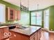 Kitchen featuring an island with granite countertops at 458 Burlington Ln, Carmel, IN 46032