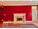 Living room with a fireplace and hardwood floors at 458 Burlington Ln, Carmel, IN 46032