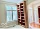 Bright office space with large built-in shelving at 458 Burlington Ln, Carmel, IN 46032