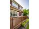 Back deck with dark brown wood and a view of the house, perfect for outdoor relaxation at 478 Firefly Ln, Carmel, IN 46032