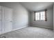 Cozy bedroom featuring a neutral color scheme, a single window, and a carpeted floor for a comfortable living space at 478 Firefly Ln, Carmel, IN 46032