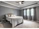 Bedroom features a decorative ceiling and three large windows with curtains at 478 Firefly Ln, Carmel, IN 46032