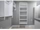Walk-in closet includes shelving and clothing racks for storage at 478 Firefly Ln, Carmel, IN 46032