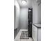 Laundry room features stackable washer and dryer unit at 478 Firefly Ln, Carmel, IN 46032