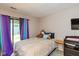 Cozy bedroom featuring carpet, sliding doors with access to backyard, and closet at 4965 Hawthorne Way, Avon, IN 46123