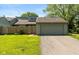 Charming home featuring an attached garage, a well-maintained lawn, and a cozy fenced-in yard at 4965 Hawthorne Way, Avon, IN 46123