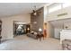 Open-concept living area featuring high ceilings, neutral tones, and a seamless flow to the dining space at 4965 Hawthorne Way, Avon, IN 46123