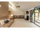Spacious living room with vaulted ceilings, a fireplace, plush seating, and lots of natural light at 4965 Hawthorne Way, Avon, IN 46123
