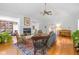 Inviting living room with a fireplace, hardwood floors, and plenty of natural light at 5108 Riverview Dr, Indianapolis, IN 46208