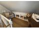 View of the bonus room showing the comfortable reading nook with natural light and open shelves at 537 N 17Th St, Noblesville, IN 46060