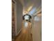 Hallway view of the bonus room featuring a light-filled space with wood accent wall at 537 N 17Th St, Noblesville, IN 46060