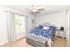 Bedroom boasts natural light and neutral walls at 5651 Pine Knoll Blvd, Noblesville, IN 46062