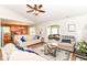 Open living room features hardwood floors, neutral paint, and modern furnishings at 5651 Pine Knoll Blvd, Noblesville, IN 46062