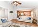 Open-concept living room with a view of the kitchen, comfortable seating, and modern decor at 5651 Pine Knoll Blvd, Noblesville, IN 46062