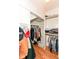 Functional closet with clothing rack and extra shelving for organized storage at 5681 Carrollton Ave, Indianapolis, IN 46220