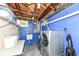 Unfinished laundry room with modern washer and dryer at 5681 Carrollton Ave, Indianapolis, IN 46220