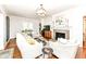 Bright living room with hardwood floors, fireplace, and stylish furnishings at 5681 Carrollton Ave, Indianapolis, IN 46220