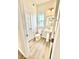 This bathroom features a pedestal sink, a toilet, and a window for natural light at 581 Roosevelt St, Fortville, IN 46040
