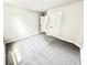 Inviting bedroom with plush carpet and a neutral color palette at 581 Roosevelt St, Fortville, IN 46040