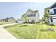 Beautiful two-story home with a two-car garage, landscaped front yard, and inviting entrance at 581 Roosevelt St, Fortville, IN 46040