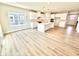 Bright, open kitchen featuring white cabinets, a large island, and stainless steel appliances at 581 Roosevelt St, Fortville, IN 46040