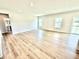 Large living room with hardwood floors at 581 Roosevelt St, Fortville, IN 46040
