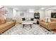 Inviting finished basement with cozy seating, stylish decor, and warm lighting at 6045 Haverford Ave, Indianapolis, IN 46220
