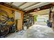 Interior of a garage with storage shelving, bike racks, and enough room for parking at 6045 Haverford Ave, Indianapolis, IN 46220