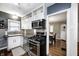 Bright kitchen with modern appliances, granite counters, and ample cabinet space at 6045 Haverford Ave, Indianapolis, IN 46220