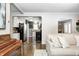 Open concept featuring hardwood floors, archways and views into the kitchen at 6045 Haverford Ave, Indianapolis, IN 46220