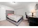 Bedroom with a desk and lamp at 6640 E Washington St, Indianapolis, IN 46219