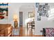 Open-concept living space with dining area and hardwood floors, ideal for Gathering gatherings at 6640 E Washington St, Indianapolis, IN 46219
