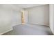 Empty bedroom with neutral carpet and a view to the bathroom at 7456 Jack Pine Ct, Avon, IN 46123