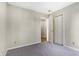 Empty bedroom featuring a double closet and view to the hallway at 7456 Jack Pine Ct, Avon, IN 46123