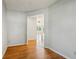 Open entryway featuring hardwood floors and a view to the bright living area at 7456 Jack Pine Ct, Avon, IN 46123