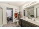 Bathroom with a double sink vanity, shower, toilet, and walk-in closet for all your needs at 7603 Merrick Dr, Brownsburg, IN 46112