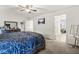 Serene main bedroom featuring a large bed, modern accents, and an en-suite bathroom at 7603 Merrick Dr, Brownsburg, IN 46112