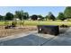 Backyard patio area with chairs, fire pit, and lush green lawn at 7870 E County Road 150 S, Avon, IN 46123