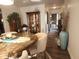 Spacious dining area with hard wood flooring, modern decor, and entryway views at 7870 E County Road 150 S, Avon, IN 46123