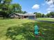 Quaint single-story home with a lush green lawn and tree-lined surroundings at 7870 E County Road 150 S, Avon, IN 46123