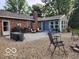 Spacious backyard patio with seating, grill, and a well-manicured lawn at 7870 E County Road 150 S, Avon, IN 46123