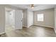 Bedroom featuring wood floors, closet space, great natural light and neutral walls for a relaxing space at 802 N Tuxedo St, Indianapolis, IN 46201