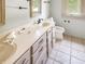Bathroom featuring a double sink vanity, a toilet, and bright neutral colored walls ready for renovation at 812 Timber Creek Dr, Indianapolis, IN 46239
