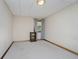 View of the basement with carpet and natural light from the window at 815 Copperfield Ln, Danville, IN 46122